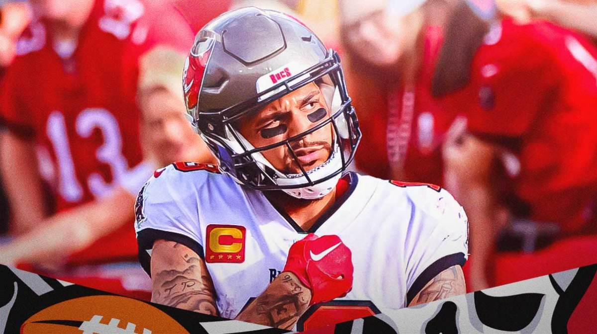Mike Evans in a Tampa Bay Buccaneers celebrating/looking happy as he scored his 100th career touchdown and got the record against the falcons on Thursday Night Football.