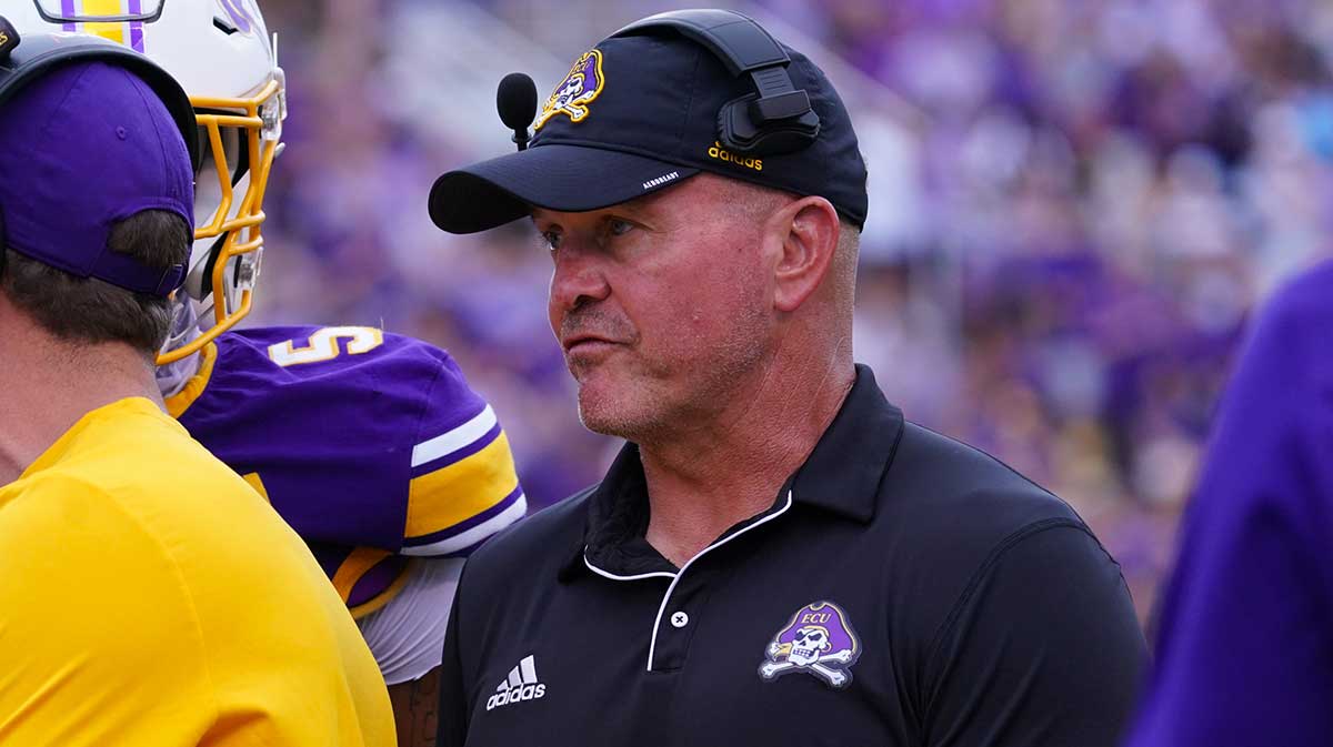 East Carolina Pirates head coach Mike Houston looks on against the Appalachian State Mountaineers during the first half at Dowdy-Ficklen Stadium.