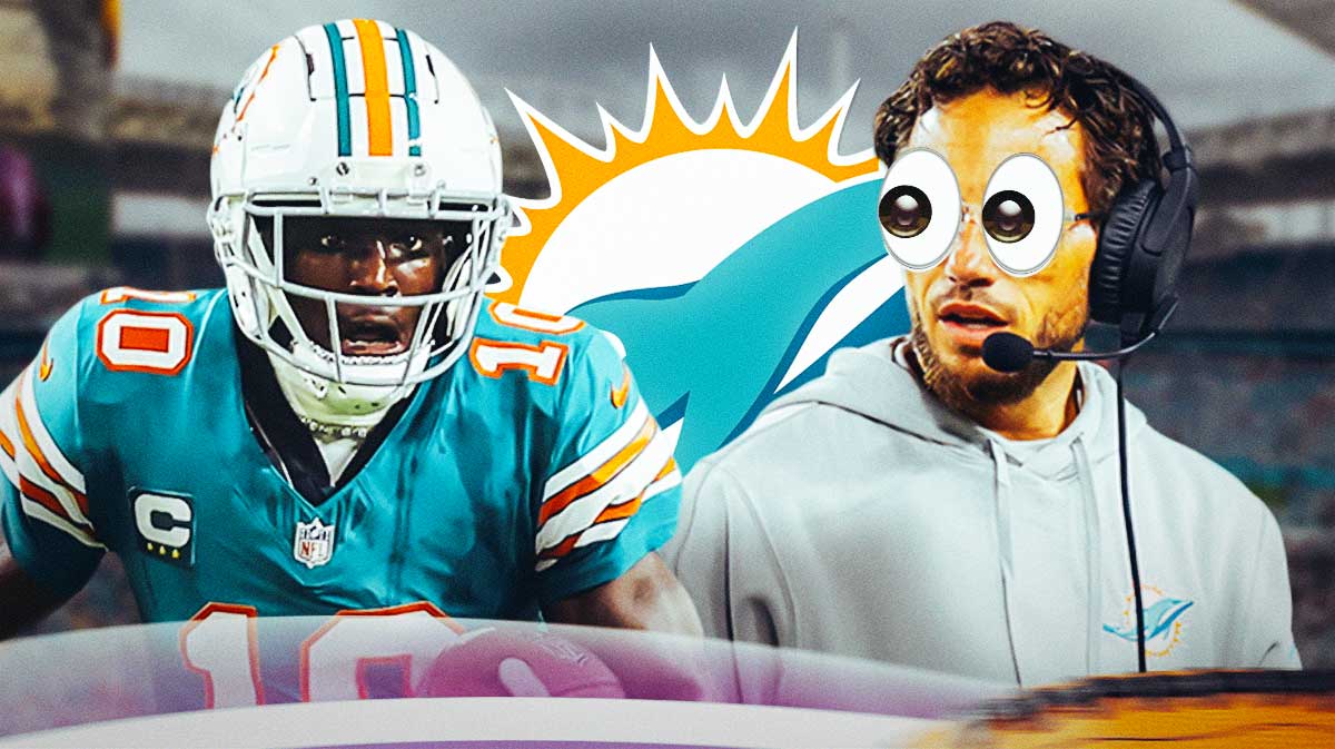 Dolphins' Mike McDaniel with emoji eyes looking at Tyreek Hill