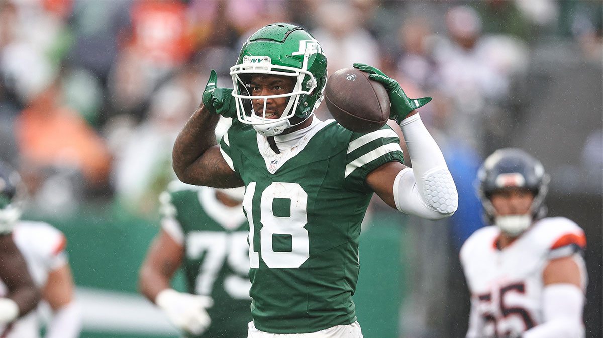 New York Jets wide receiver Mike Williams (18) celebrates a first down reception during the second half against the Denver Broncos at MetLife Stadium.