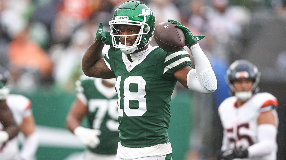 New York Jets wide receiver Mike Williams (18) celebrates a first down reception during the second half against the Denver Broncos at MetLife Stadium. 