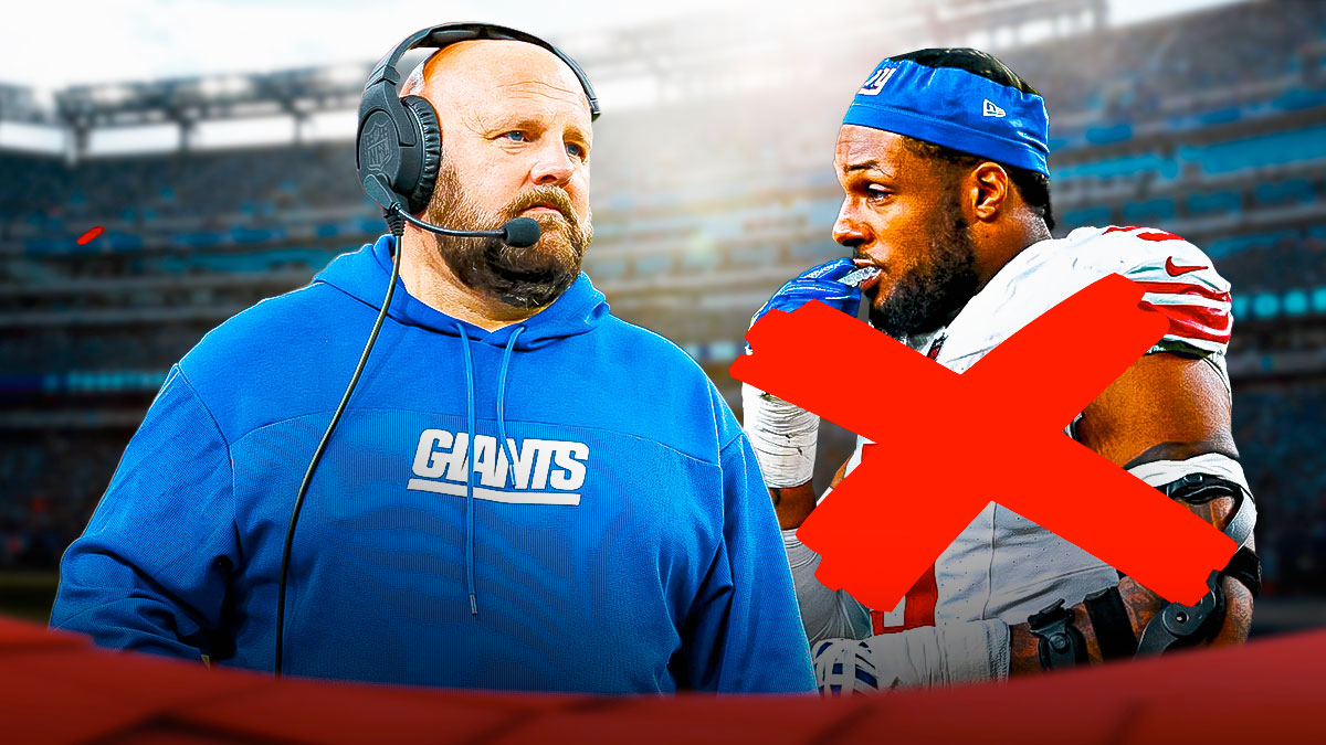 New York Giants head coach Brian Daboll looking disappointed with defensive edge rusher Kavon Thibodeaux next to him. There's also an X mark on Thibodeaux, signaling that he's not playing.