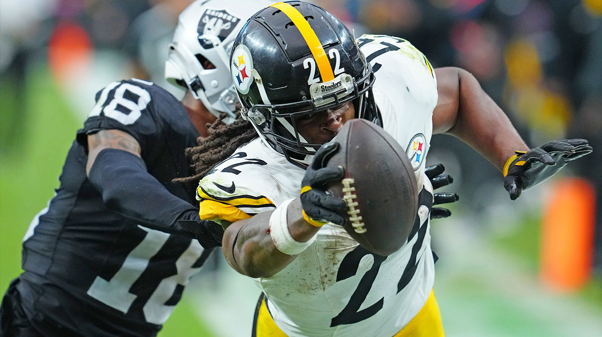Pittsburgh Steelers running back Najee Harris (22) is pushed out of bounds by Las Vegas Raiders cornerback Jack Jones (18) during the third quarter at Allegiant Stadium.