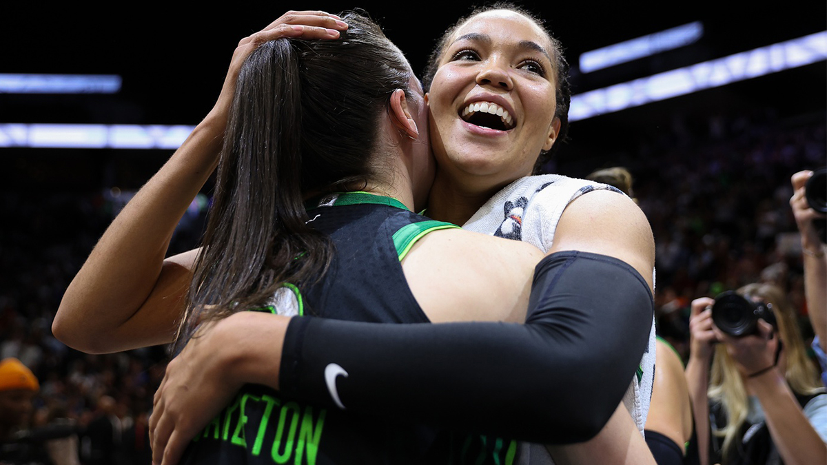 Minnesota Lynx forward Napheesa Collier (24) and forward Bridget Carleton (6) celebrate their teams win after game five of the 2024 WNBA playoffs against the Connecticut Sun.