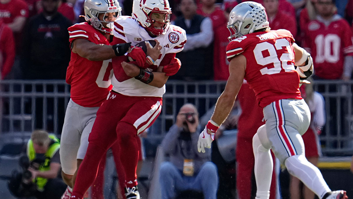 Ohio State Buckeyes linebacker Cody Simon (0) tackles Nebraska Cornhuskers quarterback Dylan Raiola (15) during the second half of the NCAA football game at Ohio Stadium in Columbus on Saturday, Oct. 26, 2024. Ohio State won 21-17.