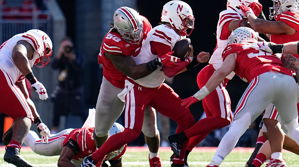 Ohio State Buckeyes defensive tackle Ty Hamilton (58) tackles Nebraska Cornhuskers quarterback Dylan Raiola (15) during the second half of the NCAA football game at Ohio Stadium in Columbus on Saturday, Oct. 26, 2024. Ohio State won 21-17.
