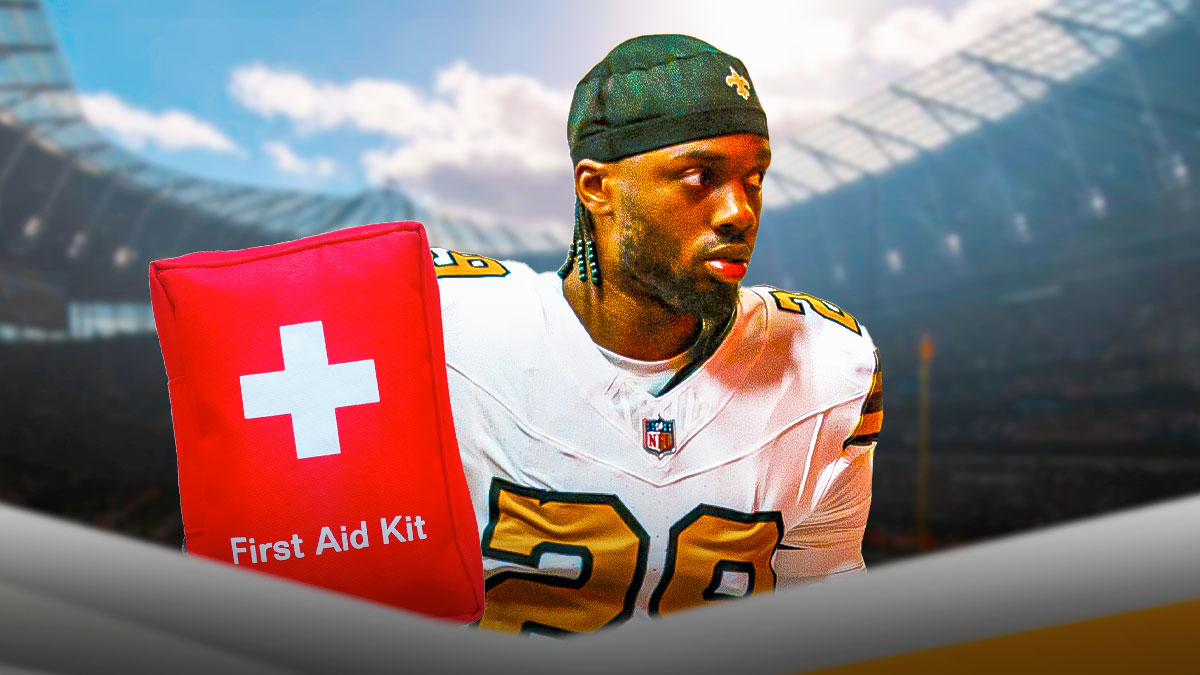 Paulson Adebo in a New Orleans Saints uniform with a red and white first aid symbol as Adebo was carted off during the Saints game with a leg injury.