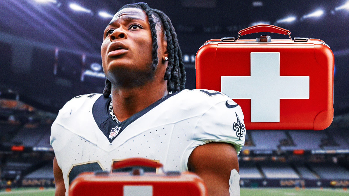 Saints Kendre Miller with first aid kit