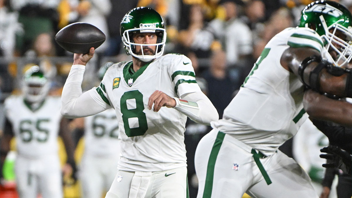 New York Jets quarterback Aaron Rodgers (8) throws pass against the Pittsburgh Steelers during the first quarter at Acrisure Stadium. 