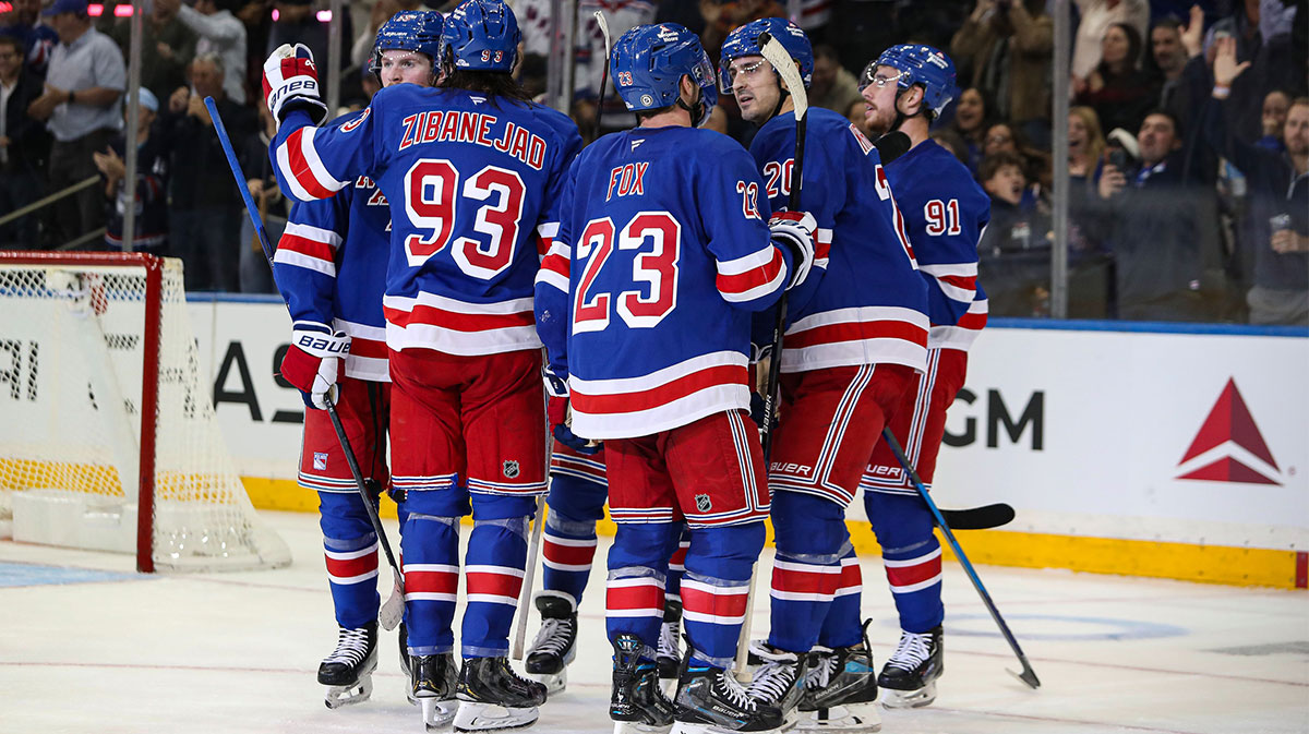New York Rangers left wing Chris Kreider (20) celebrates his goal with defenseman Adam Fox (23) during the third period against the New York Islanders at Madison Square Garden.