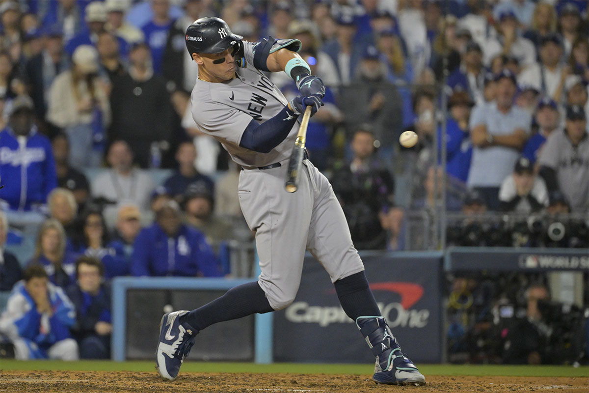 New York Yankees outfielder Aaron Judge (99) flys out in the ninth inning against the Los Angeles Dodgers during game one of the 2024 MLB World Series at Dodger Stadium.