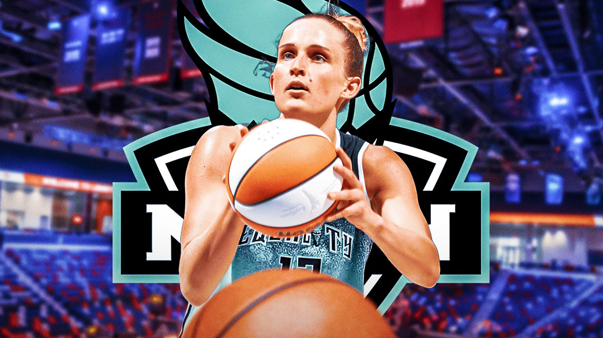 Liberty Leonie Fiebich shooting a basketball.