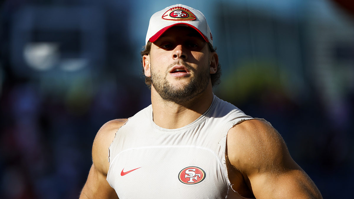 San Francisco 49ers defensive end Nick Bosa (97) returns to the locker room following early pregame warmups against the Seattle Seahawks at Lumen Field.