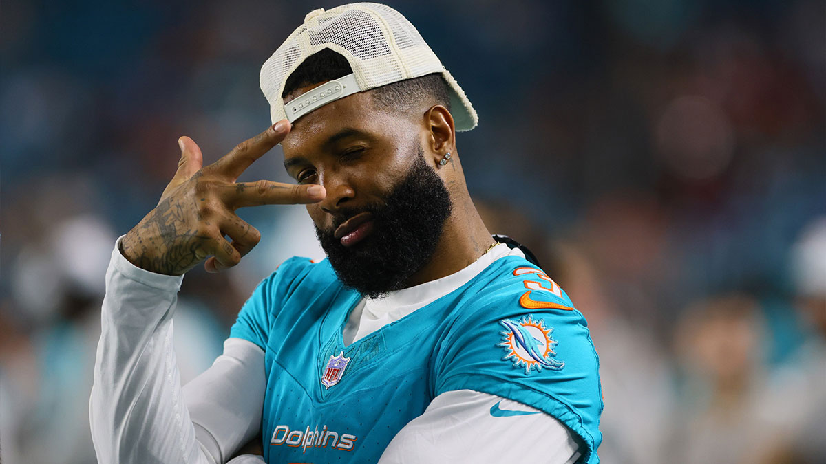 Miami Dolphins wide receiver Odell Beckham Jr. (3) reacts from the sideline against the Washington Commanders during the fourth quarter of a preseason game at Hard Rock Stadium.