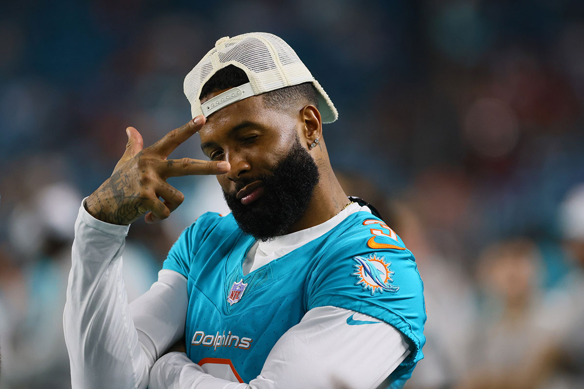 Miami Dolphins wide receiver Odell Beckham Jr. (3) reacts from the sideline against the Washington Commanders during the fourth quarter of a preseason game at Hard Rock Stadium.