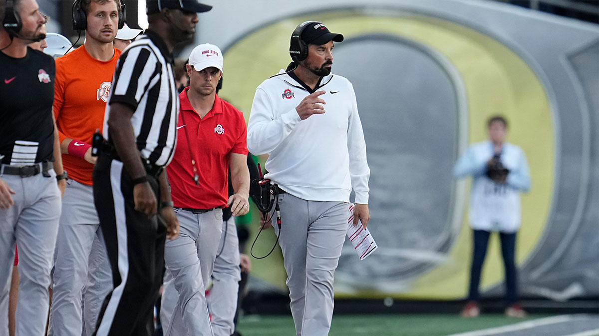 Ohio State Buckeyes head coach Ryan Day watches during the first half of the NCAA football game against the Oregon Ducks at Autzen Stadium