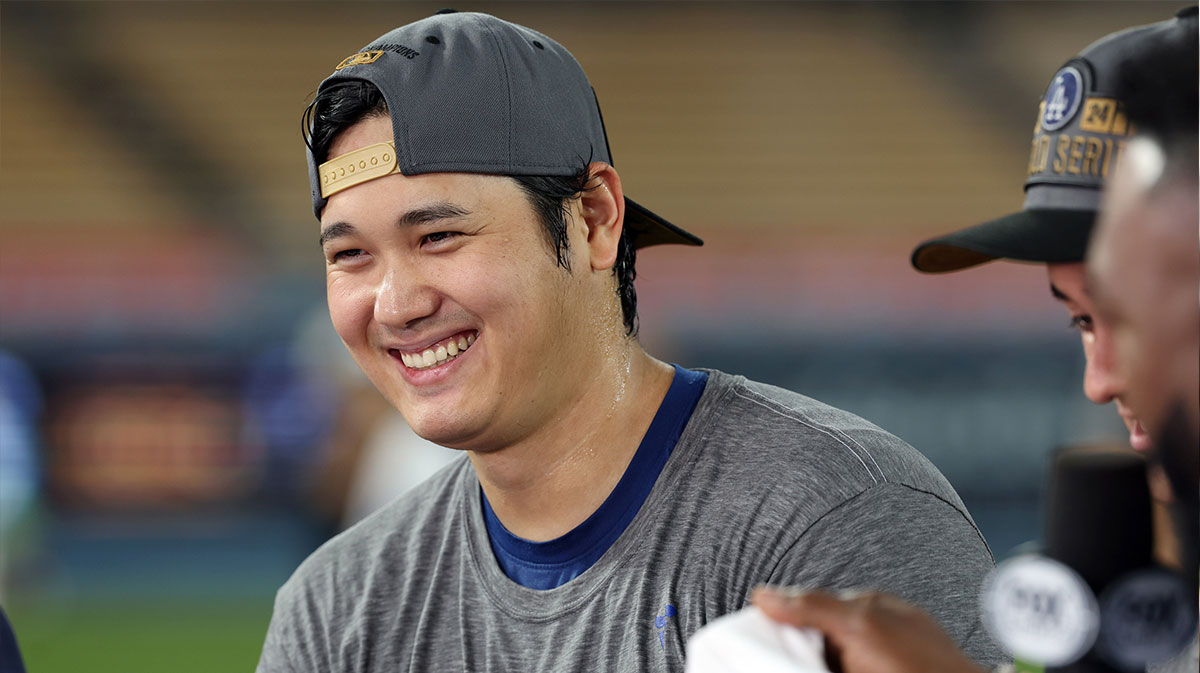 Los Angeles Dodgers designated hitter Shohei Ohtani (17) smiles in an interview after the Los Angeles Dodgers defeated the New York Mets in game six of the NLCS to advance to the World Series in the 2024 MLB playoffs at Dodger Stadium