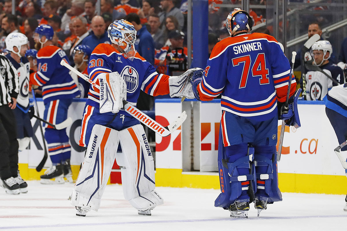 Edmonton Oilers goaltender Calvin Pickard (30) replaces goaltender Stuart Skinner (74) after allowing 5 goal on 13 shots against the Winnipeg Jets at Rogers Place