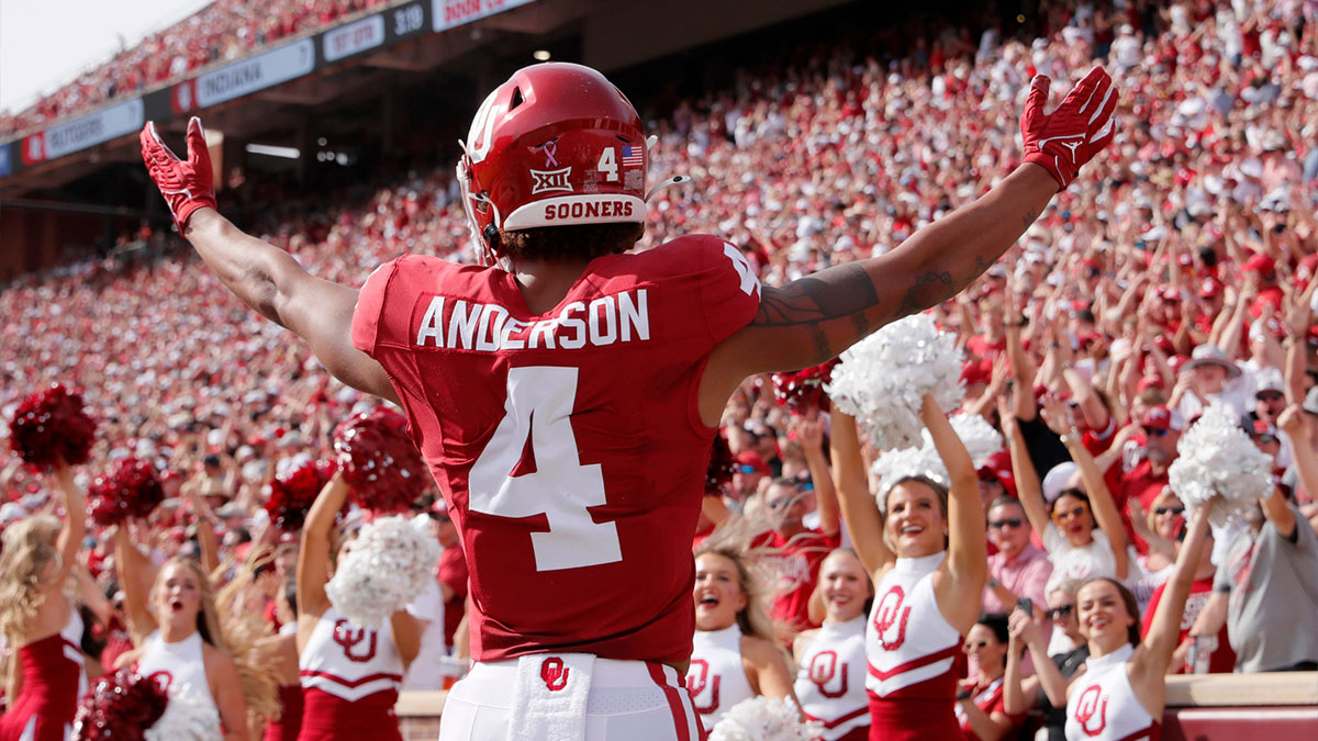 Oklahoma's Nic Anderson (4) celebrates a touchdown in the first half of the college football game between the University of Oklahoma Sooners and the University of Central Florida Knights at Gaylord Family Oklahoma-Memorial Stadium in Norman, Okla