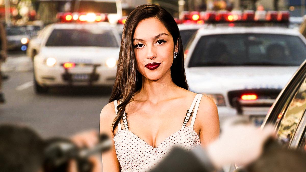 Olivia Rodrigo, who recalled being interrogated by border patrol while on the Guts World Tour, with cop cars behind her.
