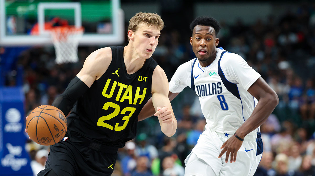 Utah Jazz forward Lauri Markkanen (23) drives to the basket as Dallas Mavericks forward Olivier-Maxence Prosper (8) defends during the second half at American Airlines Center.