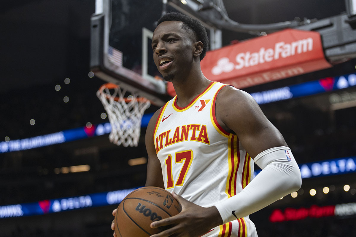 Atlanta Hawks forward Onyeka Okongwu (17) speaks with the referee in the game against the Charlotte Hornets during the first quarter at State Farm Arena.