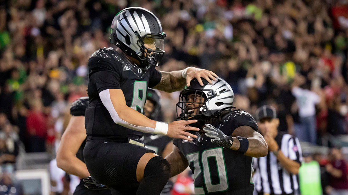 Oregon Ducks quarterback Dillon Gabriel and Oregon Ducks running back Jordan James celebrate a touchdown by Gabriel as the No. 3 Oregon Ducks host the No. 2 Ohio State Buckeyes Saturday, Oct. 12, 2024 at Autzen Stadium in Eugene, Ore.