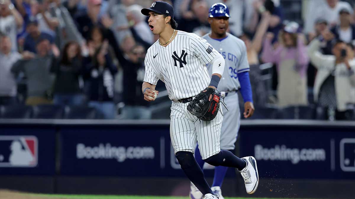 New York Yankees first baseman Oswaldo Cabrera (95) reacts after defeating the Kansas City Royals in game one of the ALDS during the 2024 MLB Playoffs at Yankee Stadium. 