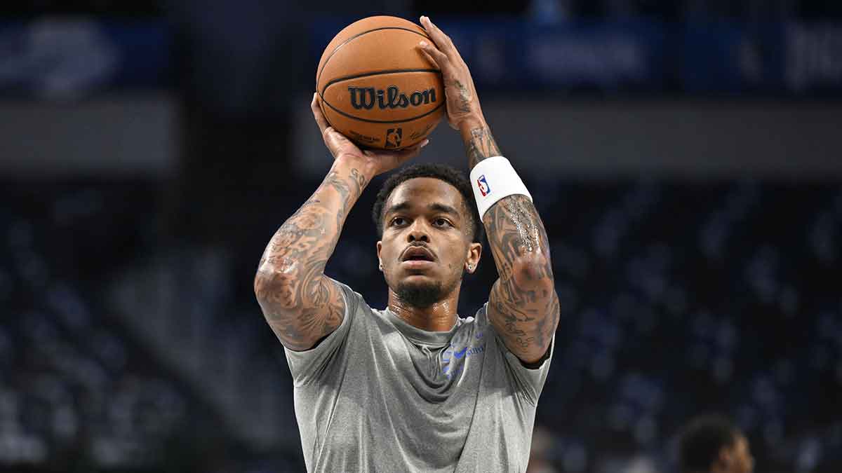 Dallas Mavericks forward P.J. Washington (25) warms up before the game between the Dallas Mavericks and the Memphis Grizzlies at the American Airlines Center.