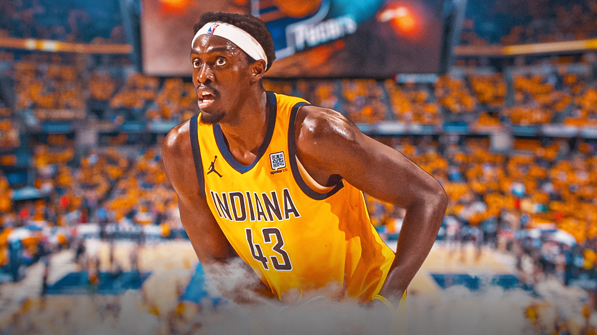 Pascal Siakam in Pacers uniform passing a basketball