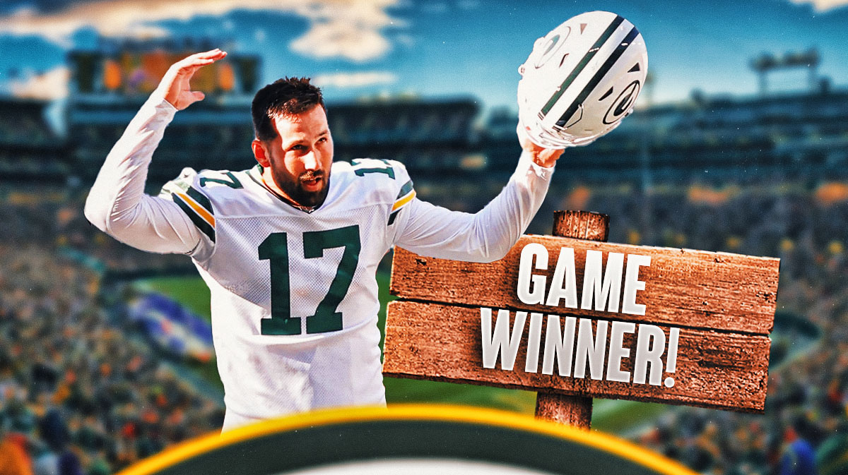 Packers' Brandon McManus celebrating next to sign that says GAME WINNER!