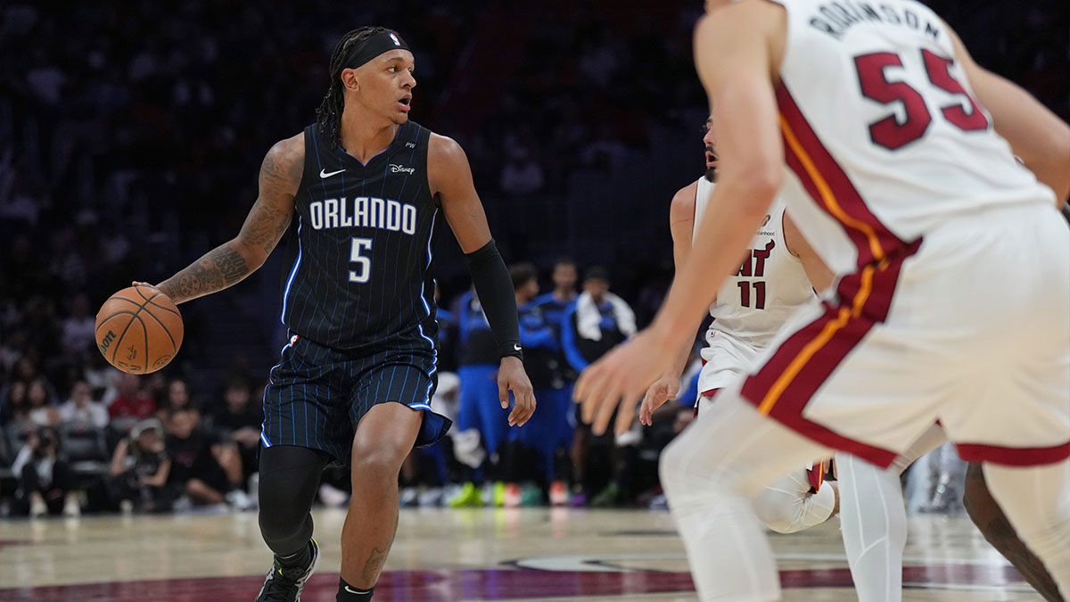 Orlando Magic forward Paolo Banchero (5) sets up the offense against the Miami Heat during the second half at Kaseya Center.