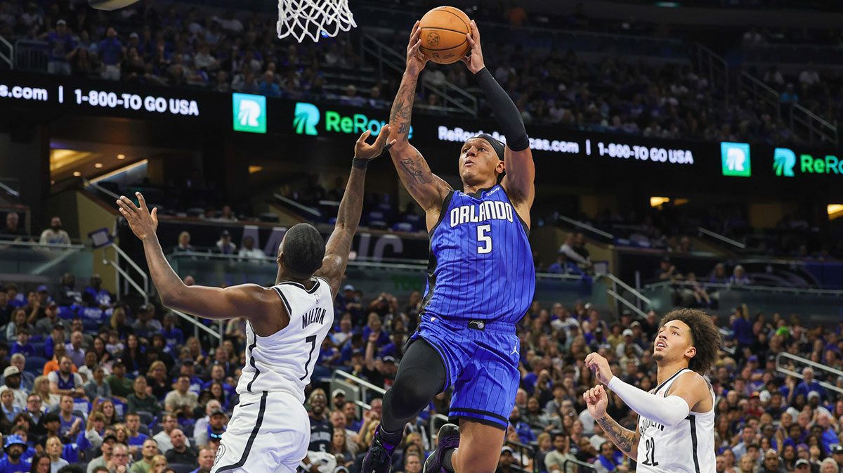 Orlando Magic forward Paolo Banchero (5) goes to the basket against Brooklyn Nets guard Shake Milton (7) during the second half at Kia Center.