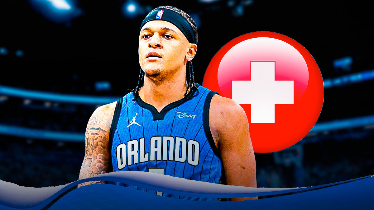 Magic All-Star Paolo Banchero with medical cross next to him