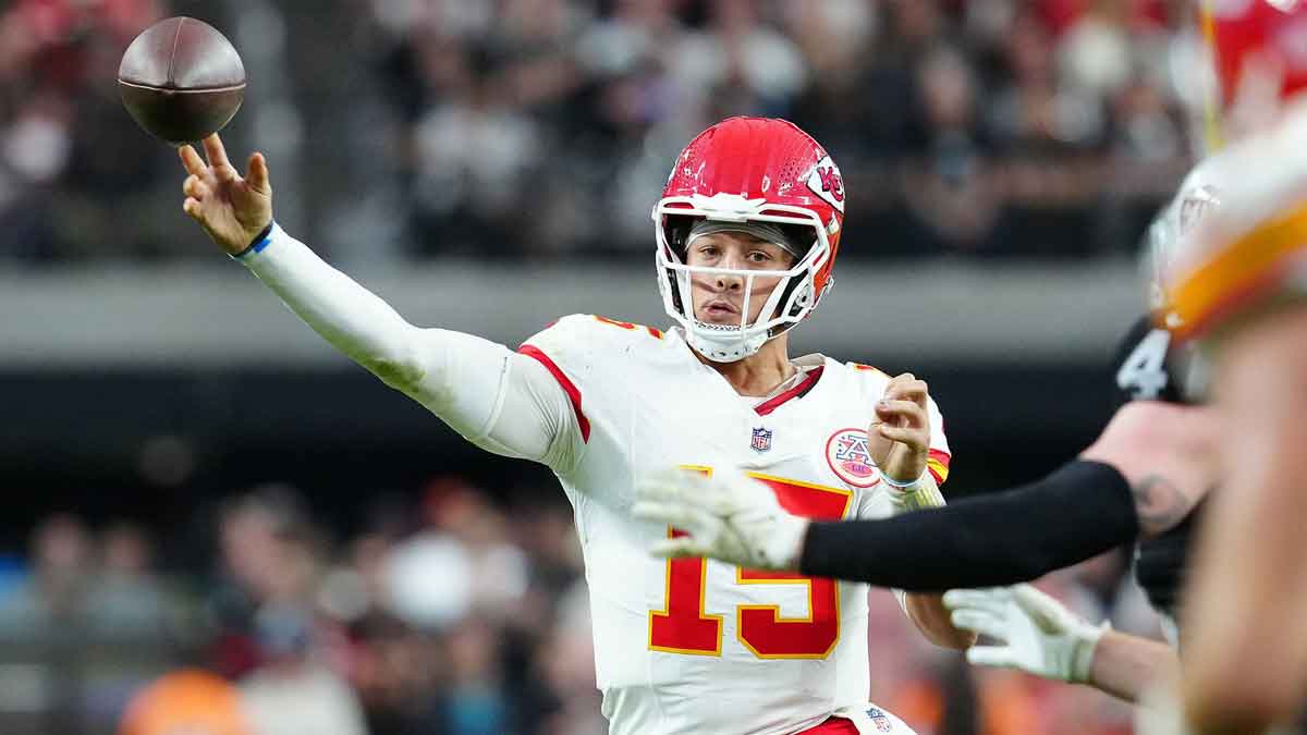 Kansas City Chiefs quarterback Patrick Mahomes (15) makes a pass attempt against the Las Vegas Raiders during the fourth quarter at Allegiant Stadium.