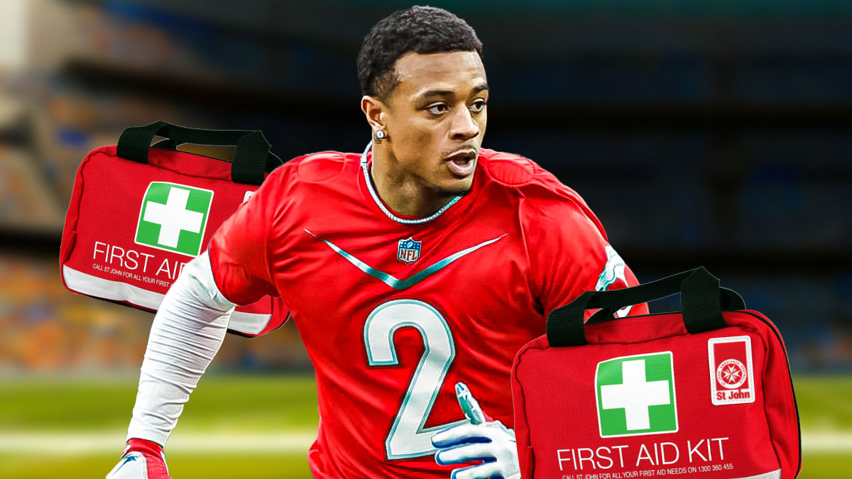 Patrick Surtain II with a first aid kit near him