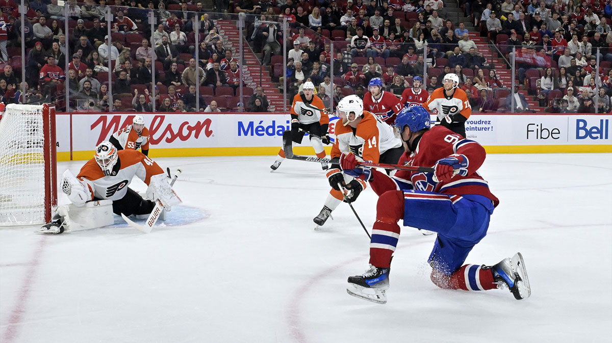 Philadelphia Flyers goalie Cal Petersen (40) makes a save against Montreal Canadiens forward Patrik Laine (92) during the second period at the Bell Centre.