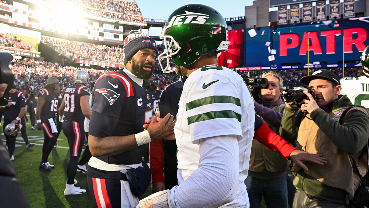 Patriots quarterback Jacoby Brissett (7) shakes hands with New York Jets quarterback Aaron Rodgers (8) after a game at Gillette Stadium