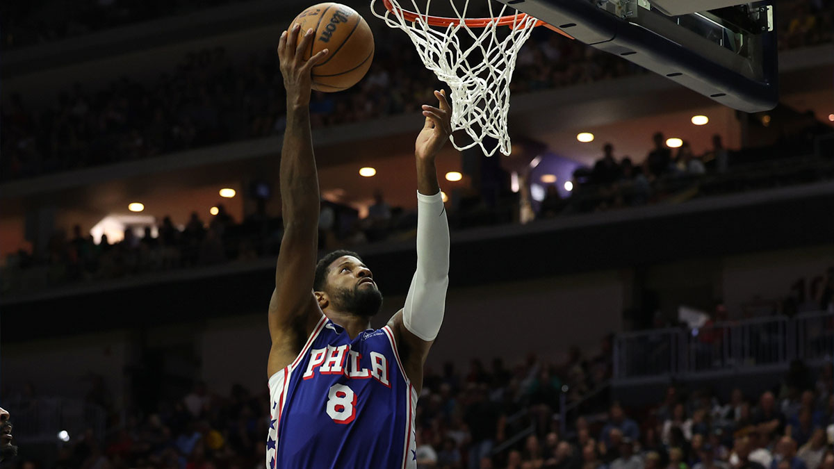 Philadelphia 76ers forward Paul George (8) scores a basket against the Minnesota Timberwolves at Wells Fargo Arena.