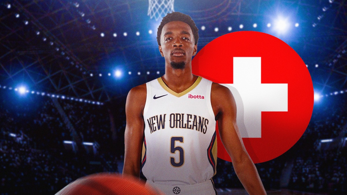 Pelicans' Herb Jones with medical Red Cross symbol