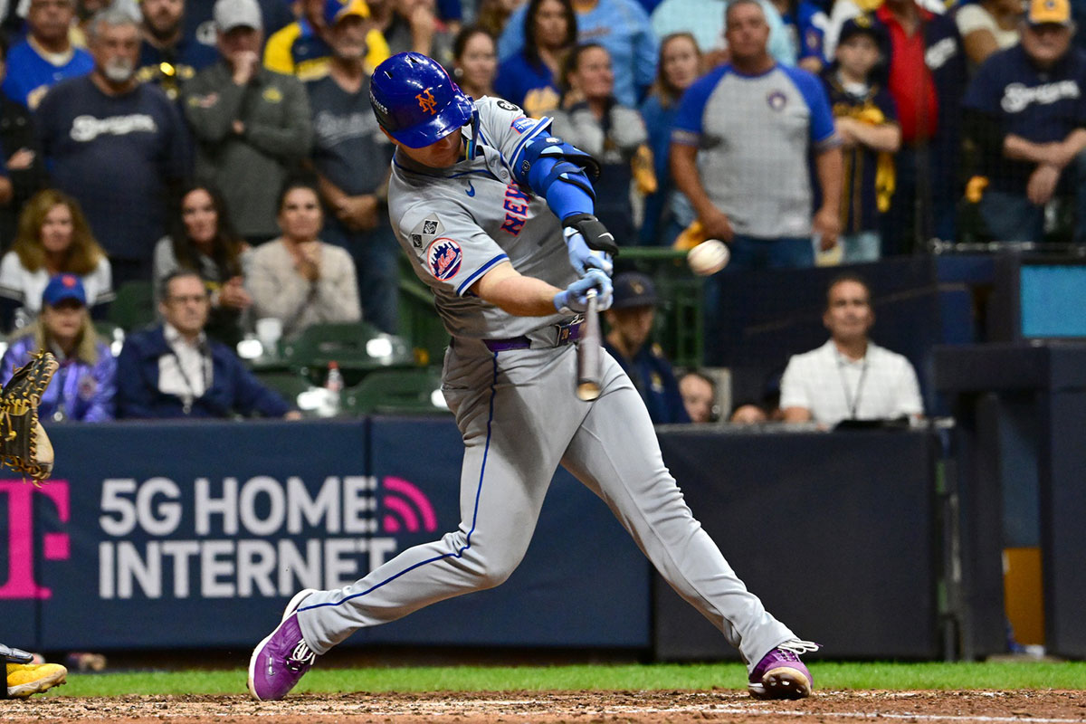 New York Mets first baseman Pete Alonso (20) hits a three run home run against the Milwaukee Brewers in the ninth inning during game three of the Wildcard round for the 2024 MLB Playoffs at American Family Field.