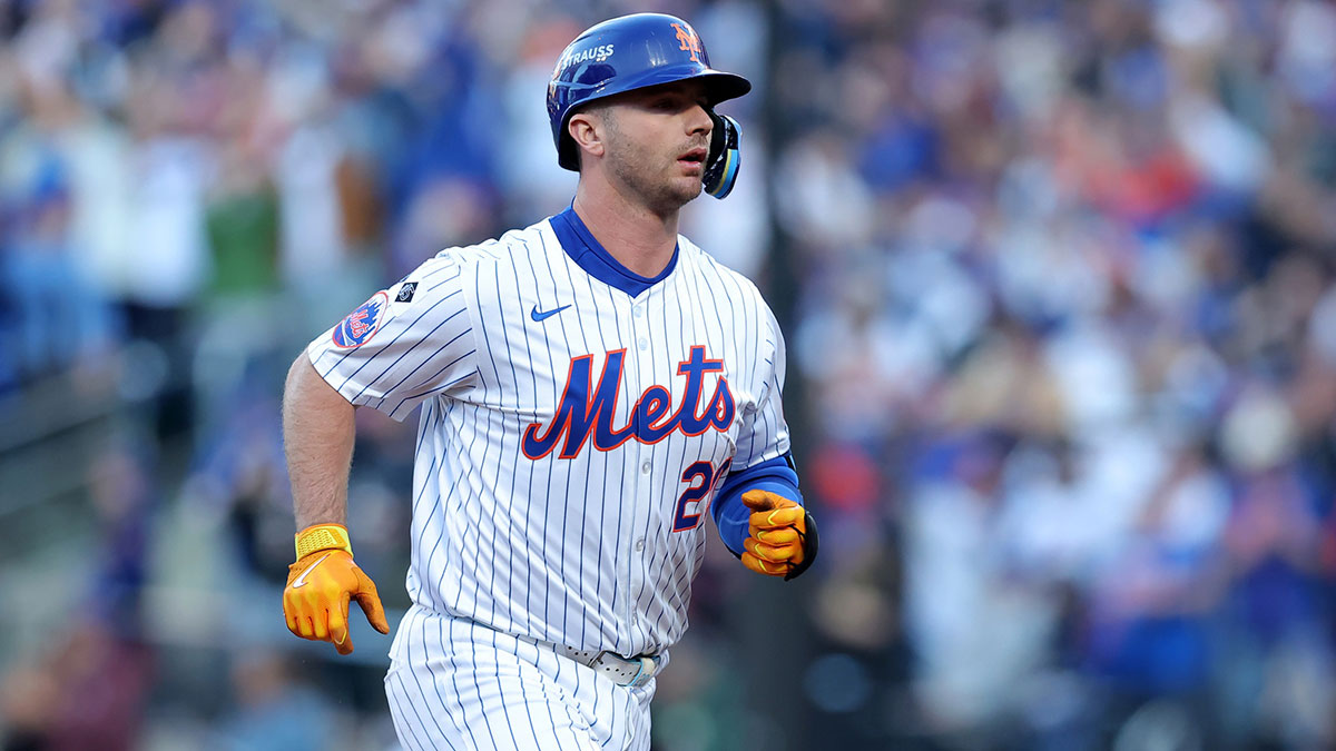 New York Mets first baseman Pete Alonso (20) rounds the bases after hitting a three run home run against the Los Angeles Dodgers during the first inning of game five of the NLCS during the 2024 MLB playoffs at Citi Field.