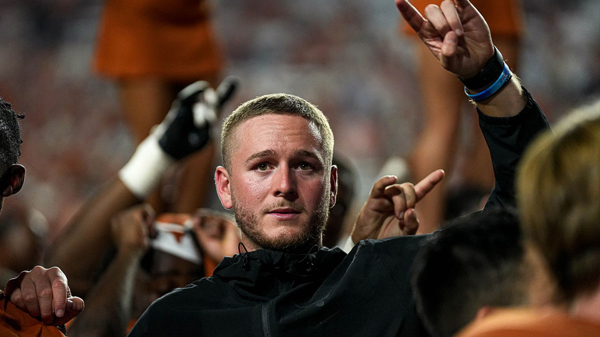 Texas Longhorns quarterback Quinn Ewers (3) holds up the sign of the horns after the win over UTSA at Darrell K Royal–Texas Memorial Stadium.