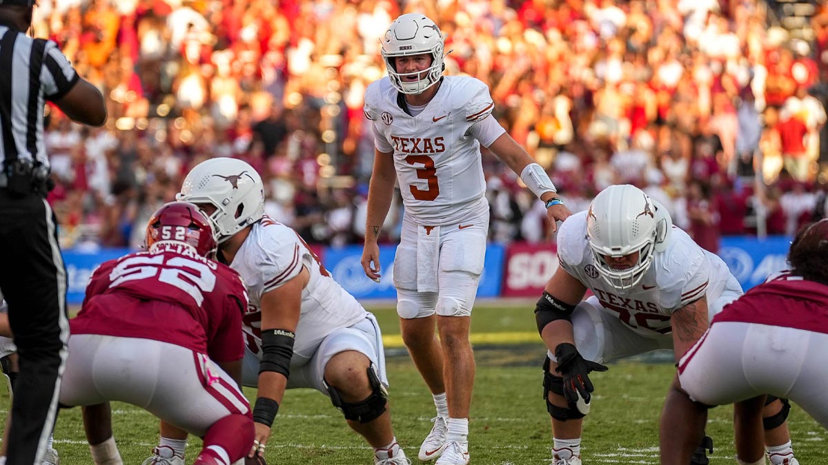 Texas Longhorns quarterback Quinn Ewers (3) lines up for a snap during the Red River Rivalry game against Oklahoma at the Cotton Bowl