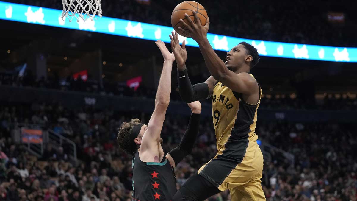 Toronto Raptors guard RJ Barrett (9) goes up to make a basket against Washington Wizards forward Corey Kispert (24) during the second half at Scotiabank Arena