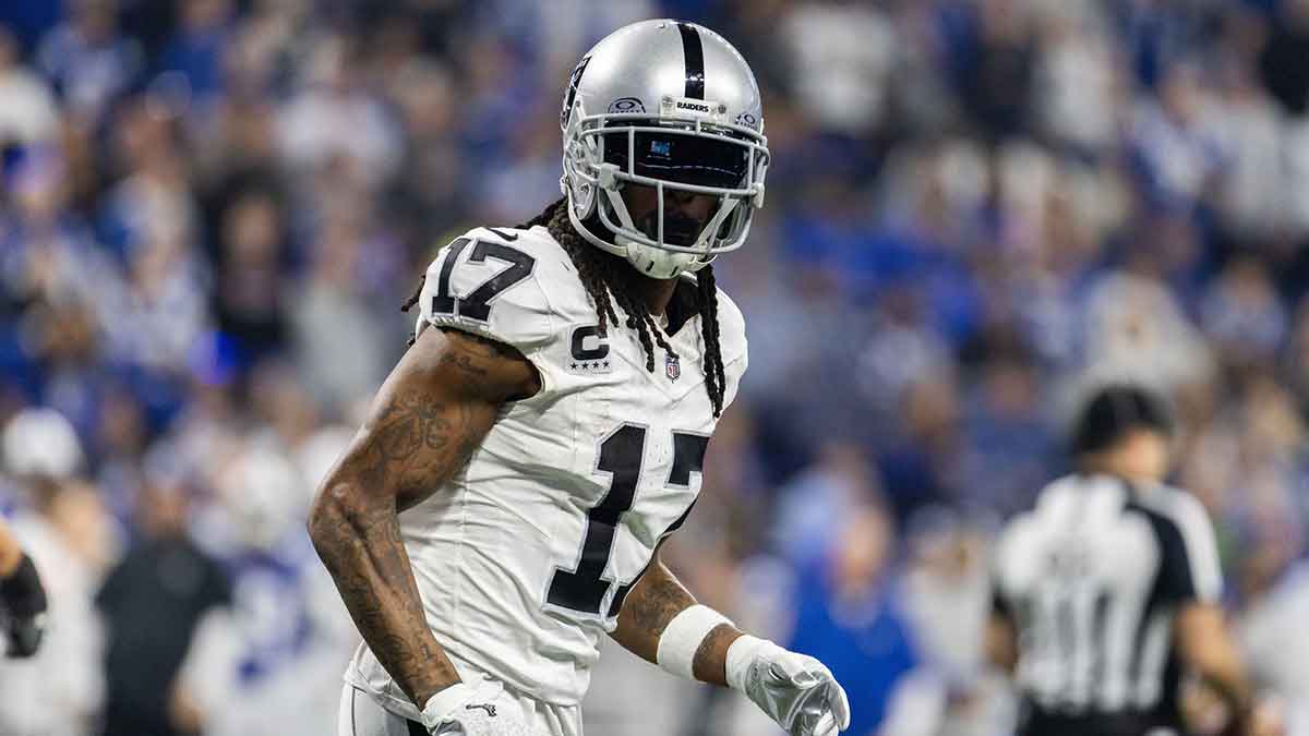 Las Vegas Raiders wide receiver Davante Adams (17) celebrates his touchdown in the second half against the Indianapolis Colts at Lucas Oil Stadium