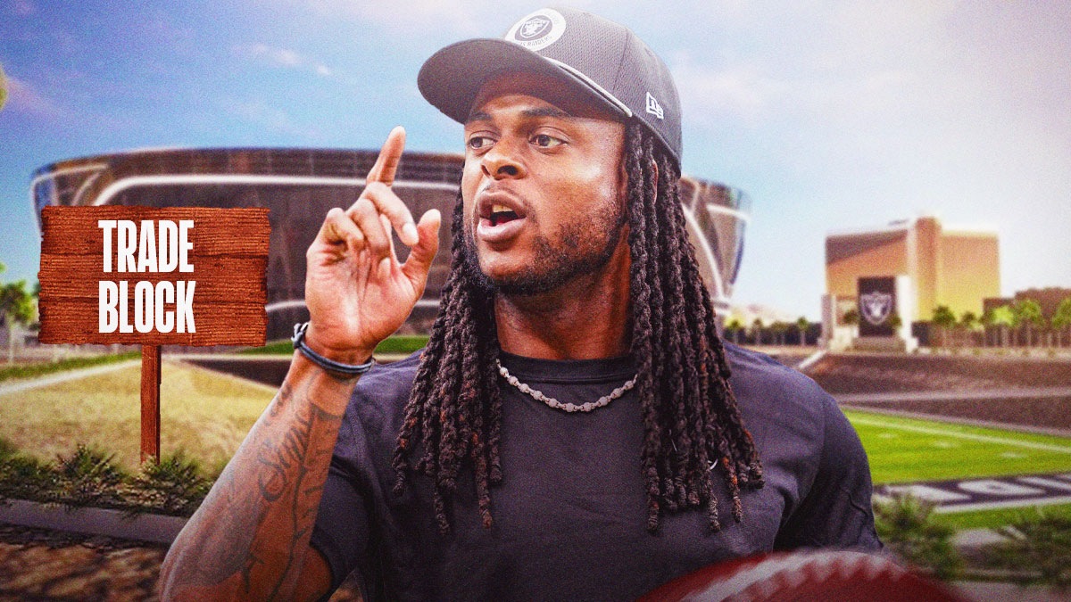 Raiders' Davante Adams next to a sign that says TRADE BLOCK