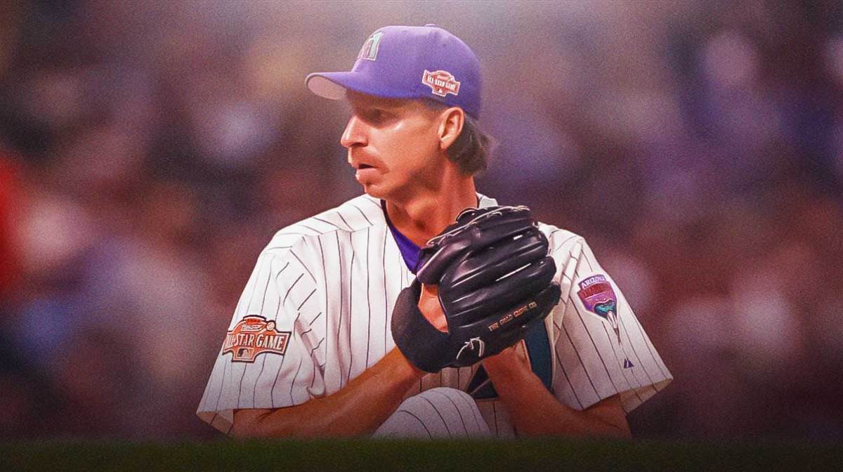 Photo: Randy Johnson looking serious pitching