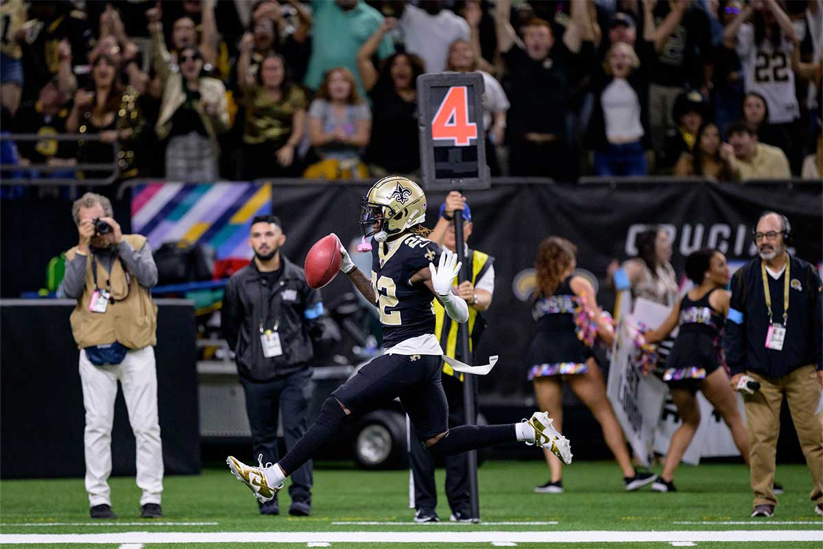 New Orleans Saints wide receiver Rashid Shaheed (22) returns a punt for a touchdown during the second quarter against the Tampa Bay Buccaneers at Caesars Superdome.