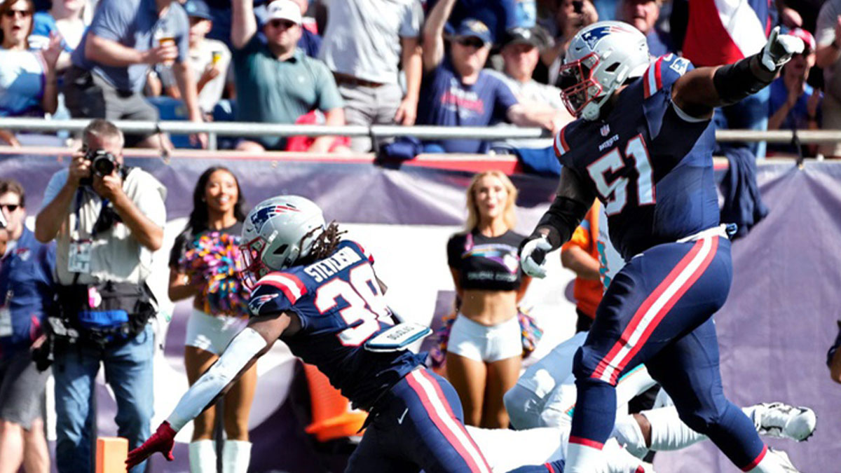New England running back Rhamondre Stevenson crosses the goal line for a first-half touchdown for the Patriots, one of the few bright spots on Sunday..